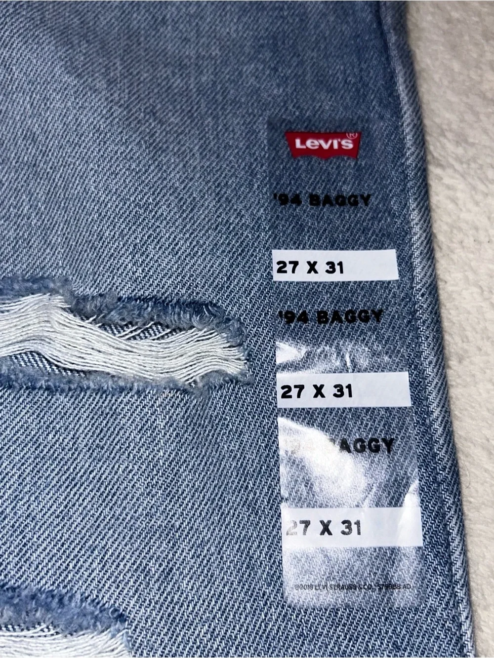Levi's silver tap Light Blue Distressed Straight-Leg Jeans 27x31